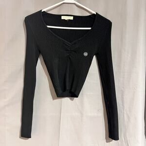 long-sleeve crop top is likely from the brand La Hearts Size Extra Small TG2063